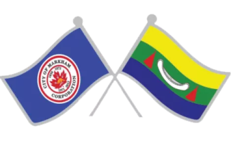 markham and eabametoong First Nations flags side by side