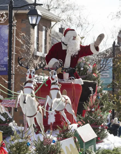 Santa Claus on parade float.